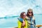 PATAGONIA, ARGENTINA - JANUARY 7, 2018: Couple on background of the Perito Moreno Glacier. With selective focus