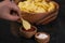 Patato chips recipe. natural fried crisps in a bowl.