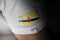 Patch of the national flag of the Brunei on a white t-shirt