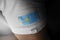 Patch of the national flag of the Kazakhstan on a white t-shirt