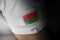 Patch of the national flag of the Madagascar on a white t-shirt