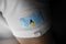 Patch of the national flag of the Saint Lucia on a white t-shirt