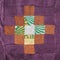 Patchwork with brown pattern on purple fabric