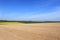 Patchwork farmland with colourful fields in springtime