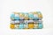 Patchwork and fashion concept - beautiful stack of colorful quilts, bedspreads stacked in several rows in height for storage, sale