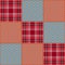 Patchwork seamless pattern of red textured squares