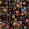 Patchwork seamless pattern from stitched square patterns with colorful embroidered flowers