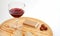 Pate, bread, glass of red wine, hazelnuts on wood plate