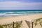 Path access dune sand beach of la jenny in atlantic ocean France