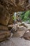 Path along the rocky riverbed to the Mosquito waterfall in Chapada Diamantina