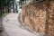 Path ancient wall paved with bricks in park