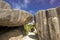 Path between boulders rocks La Digue island Seychelles, vacation background