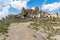 Path and buildings in Craco ghost town, Basilicata, Italy