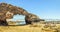 Path gate beautiful to the sea volcanic rocks