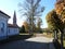 Path, home, church and autumn trees, Lithuania