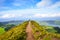 A path leading to viewpoint Miradouro da Boca do Inferno in Sao Miguel Island, Azores, Portugal. Amazing crater lakes surrounded