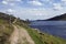 The path beside loch turret reservoir in the Scottish Highlands on a sunny day