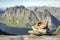 Path marker cairn on way to Munkan peak in Lofotens, Norway