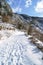 The path in the mountains on a winter day