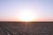 Path on Namak salt lake at Sunset, in Maranjab desert, near Kashan, Iran