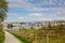 Path through nature in HundvÃ¥g, with lysefjord and island of BjÃ¸rnÃ¸y behind. Stavanger, Norway