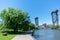 Path next to the Chicago River with a Railroad Bridge at Ping Tom Memorial Park in Chinatown Chicago