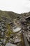 Path between old slate spoil heaps