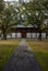 A path in a park leading to a building in Toji Temple area in Kyoto in Japan in early spring