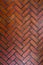 The path paved with red brick in herringbone pattern, Red stone walkway herringbone style pattern