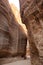 Path through the Siq, which is the narrow gorge passage that you walk along to reach Petra, Jordan