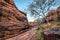 Path through steep cliffs, Entrance for lower and upper Shivalaya in Badami, Karnataka, INDIA