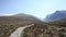 Path to Ben Nevis Scotland UK with snow topped mountains in the Grampians Lochaber Highlands pan