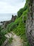 Path to Sabautsuga, the only well at the east of Irabu island. People used to go down 124 stone