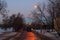 Path way with yellow lighting lanterns in Moscow Park Kolomenskoe