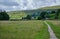 Path through wildflower meadows. Muker, Yorkshire Dales, England.