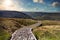 Path winding through moorland and forest