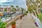 Pathway along a canal with docks and leisure boats in Long Beach California