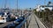 Pathway alongside the sailboats in the marina