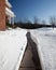 Pathway dug to modern brick house