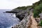 Pathway fence customs path by the sea beach mediterranean coast at Antibes Juan-les-Pins in France