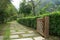 Pathway in garden with wood door