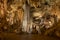 Pathway leads to a massive double column in Giant`s Hall, Luray Caverns, Luray, VA