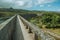 Pathway over the concrete dam of Rossim Lake