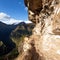 Pathway and rock face, Mount Saksarayuq, Andes mountains