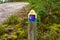 Pathway with shell blue yellow sign of Camino de Santiago de Compostela routes for pilgrim