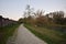 Pathway surrounded by greenery near the Serio river in Crema in Italy