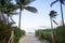 Pathway to the beach in Miami Florida with ocean background, the best place for your vacation