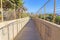 Pathway in between the walls with cable fence at San Clemente, California