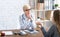 Patient complaints. Woman doctor attentively listens to client