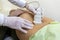 A patient gets an ultrasound scan in a hospital